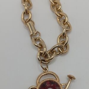 Elegant Gold Chain Necklace with Red Pendant